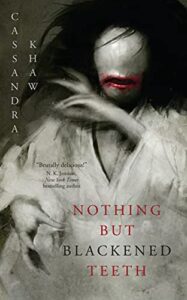 cover art for Nothing But Blackened Teeth by Cassandra Khaw
